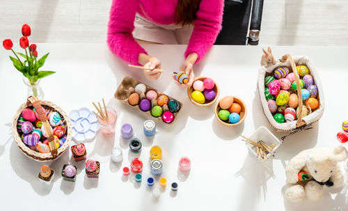 High angle view of multi colored candies on table