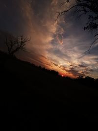 Scenic view of silhouette landscape against sky during sunset