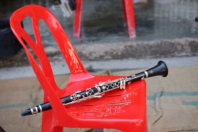 Close-up of toy bicycle against wall