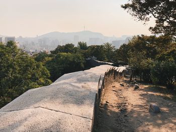 High angle view of trees on mountain against sky