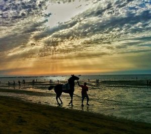 Scenic view of sea at sunset