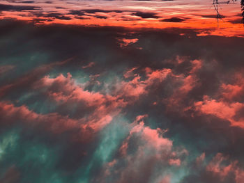 Low angle view of dramatic sky during sunset