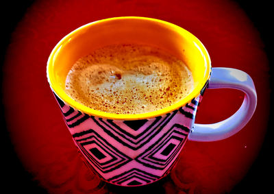 High angle view of coffee cup on table