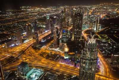 High angle view of illuminated cityscape at night