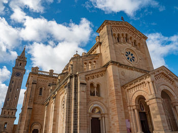 Low angle view of historical building against sky