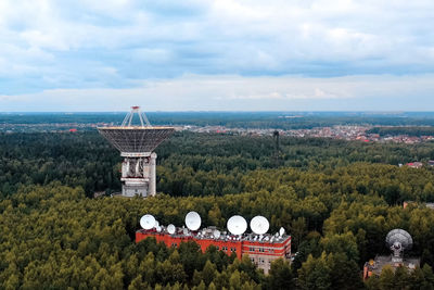 Built structure on landscape against sky