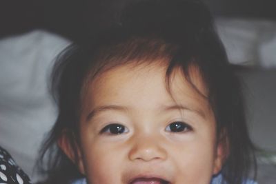 Close-up portrait of smiling boy