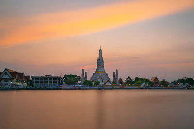 View of buildings against sky during sunset