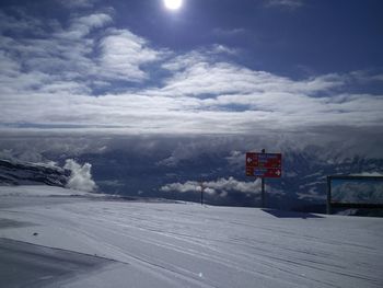 Road passing through snow covered mountain