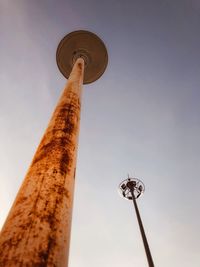 Low angle view of floodlight against sky