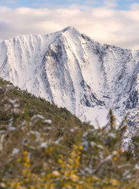 Scenic view of mountains against sky during winter