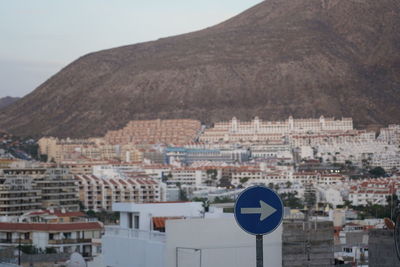 High angle view of townscape against mountain