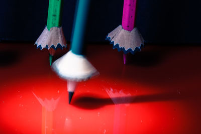 Close-up of colored pencils on floor