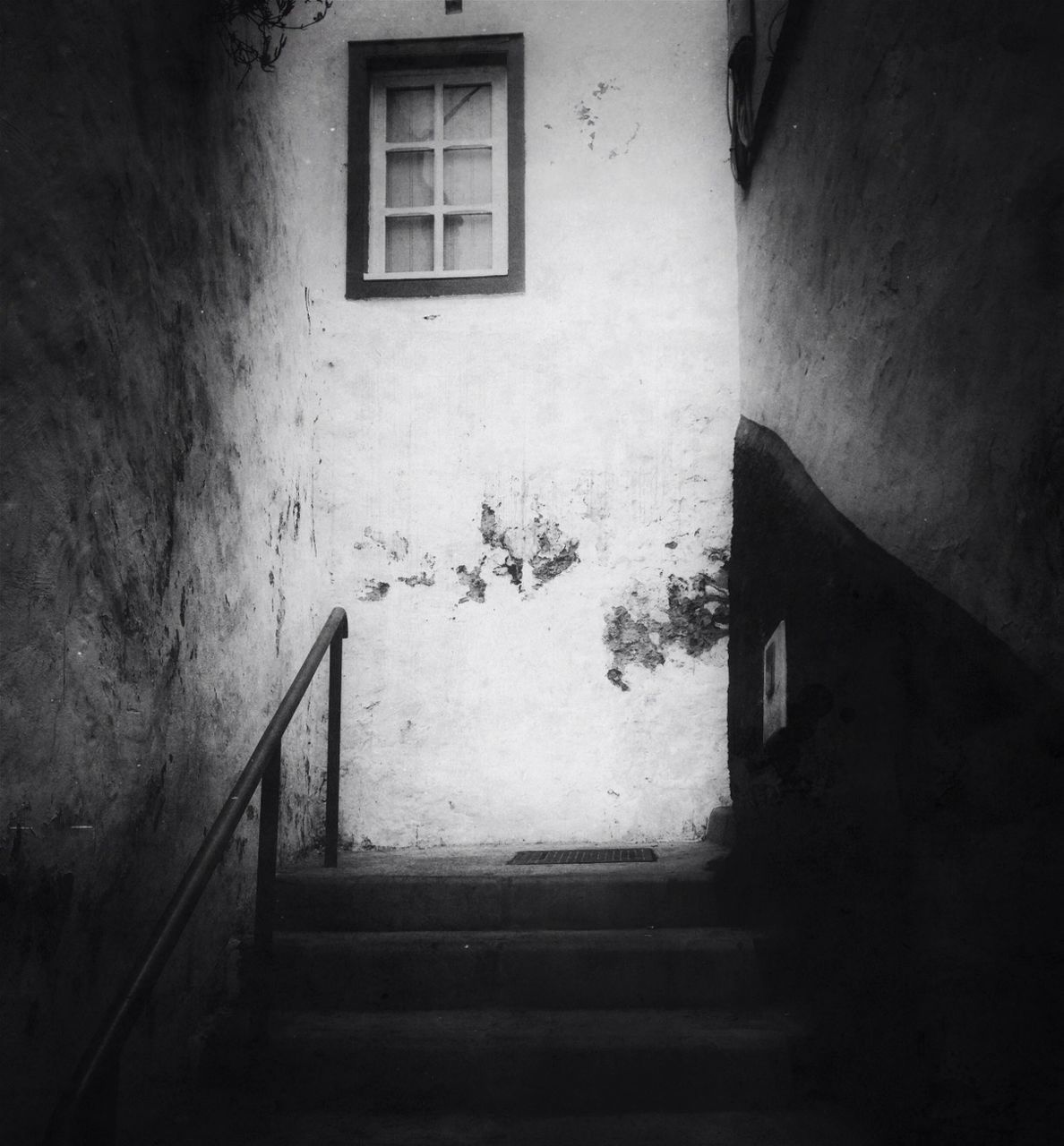 architecture, built structure, building exterior, window, wall - building feature, house, steps, building, wall, residential structure, low angle view, door, residential building, staircase, steps and staircases, railing, no people, day, brick wall, abandoned