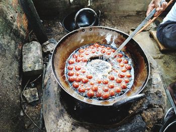 High angle view of meat in cooking pan