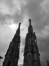 Low angle view of temple building against cloudy sky