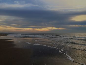 Scenic view of sea at sunset