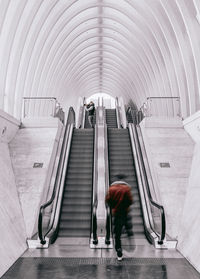 High angle view of people on escalator