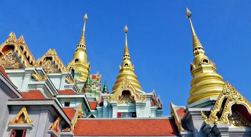 High section of temple against clear blue sky