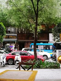 View of cars parked in city