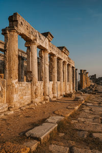 Roman amphitheater in the ruins of hierapolis, in pamukkale, turkey. unesco world heritage in turkey
