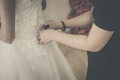 Close-up of woman holding hands