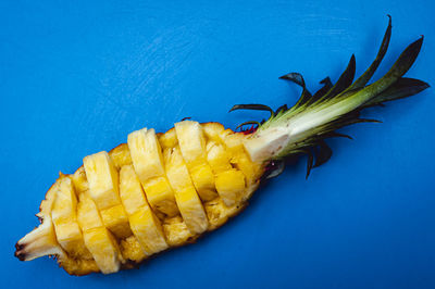 Close-up of yellow chili peppers on table