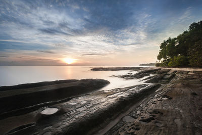 Sundown. long exposure capture of coast and ocean on borneo, sabah - malaysia
