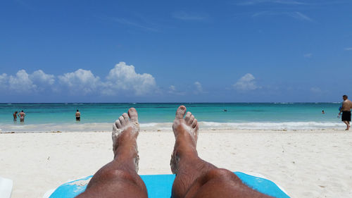 Low section of people on beach