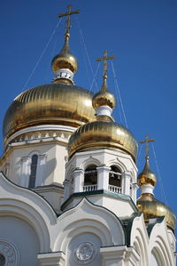 Low angle view of building against blue sky