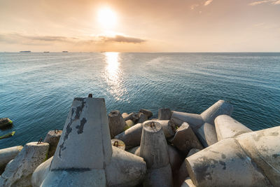 Scenic view of sea against sky during sunset