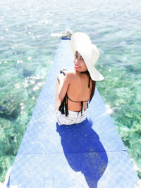 High angle view of woman in swimming pool