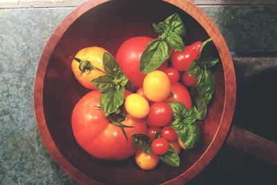 Directly above view of tomatoes in container