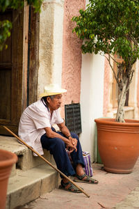 Portrait of old man looking away