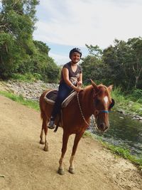 Woman riding horse