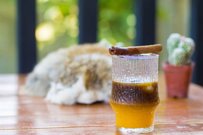 Close-up of beer glass on table