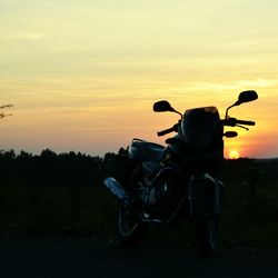 Scenic view of landscape at sunset