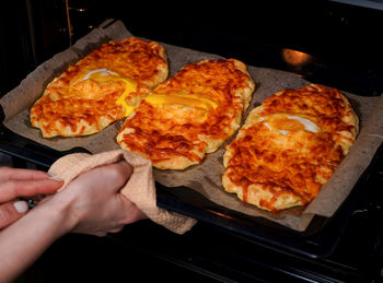 Midsection of person preparing food