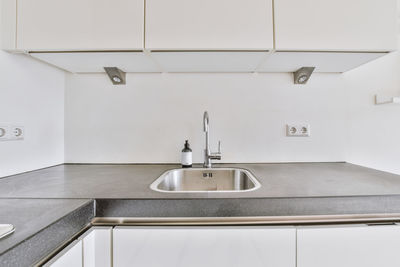 View of sink in kitchen counter