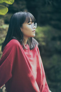 Side view of girl looking away outdoors