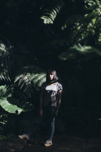 Portrait of a young woman in forest