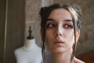 Close-up of woman looking away