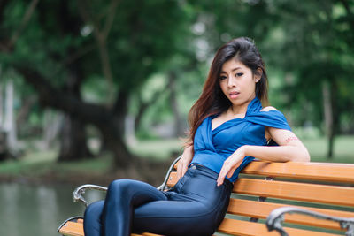 Portrait of woman sitting on seat