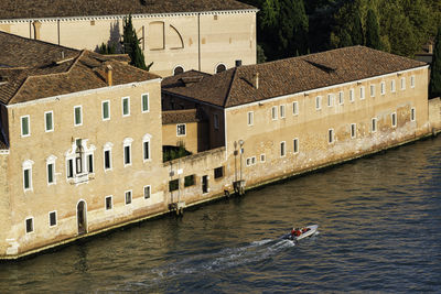 High angle view of buildings by canal