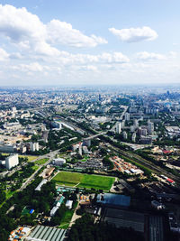 High angle view of buildings in city against sky