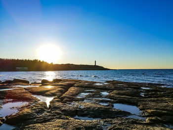 Scenic view of sea against clear sky