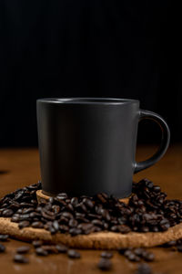 Close-up of coffee cup on table