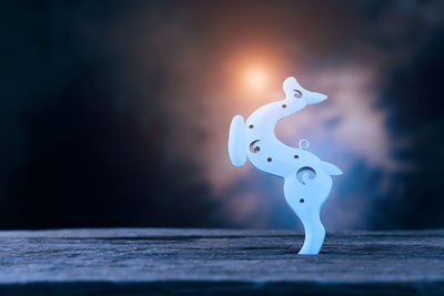 Close-up of animal representation on table