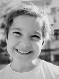 Close-up portrait of smiling girl