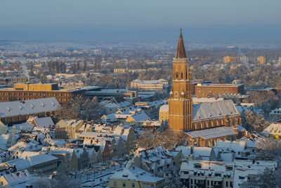 High angle view of buildings in city against sky